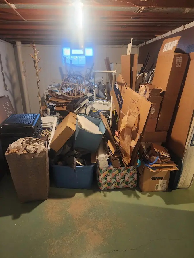 Roll-off dumpster container at job site for Construction Dumpster Rental in West Loch Estate